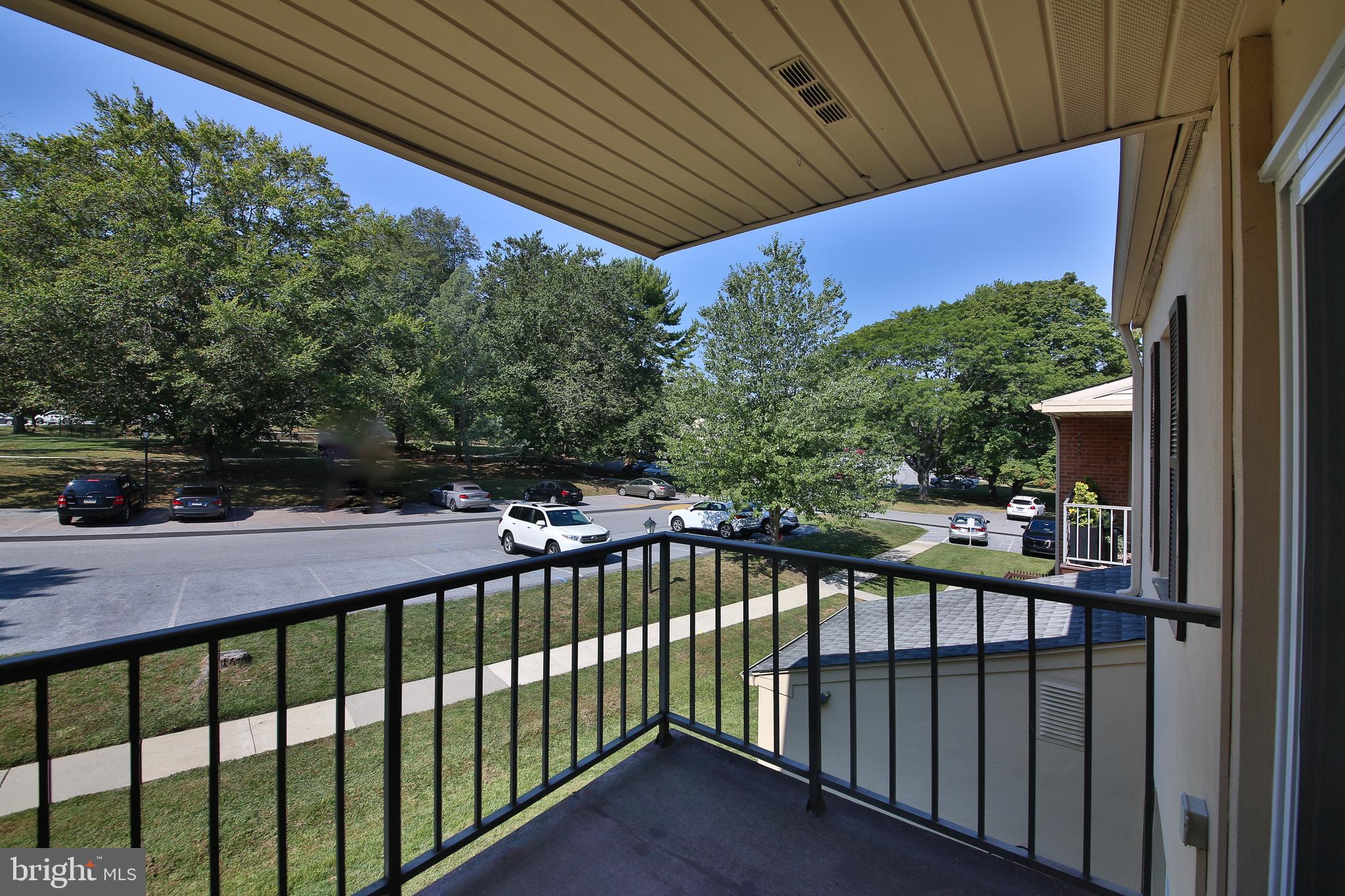 463 Old Forge Crossing, Unit 463 Devon, PA 19333 - Photo 20 of 35 Covered balcony accessed from the living room