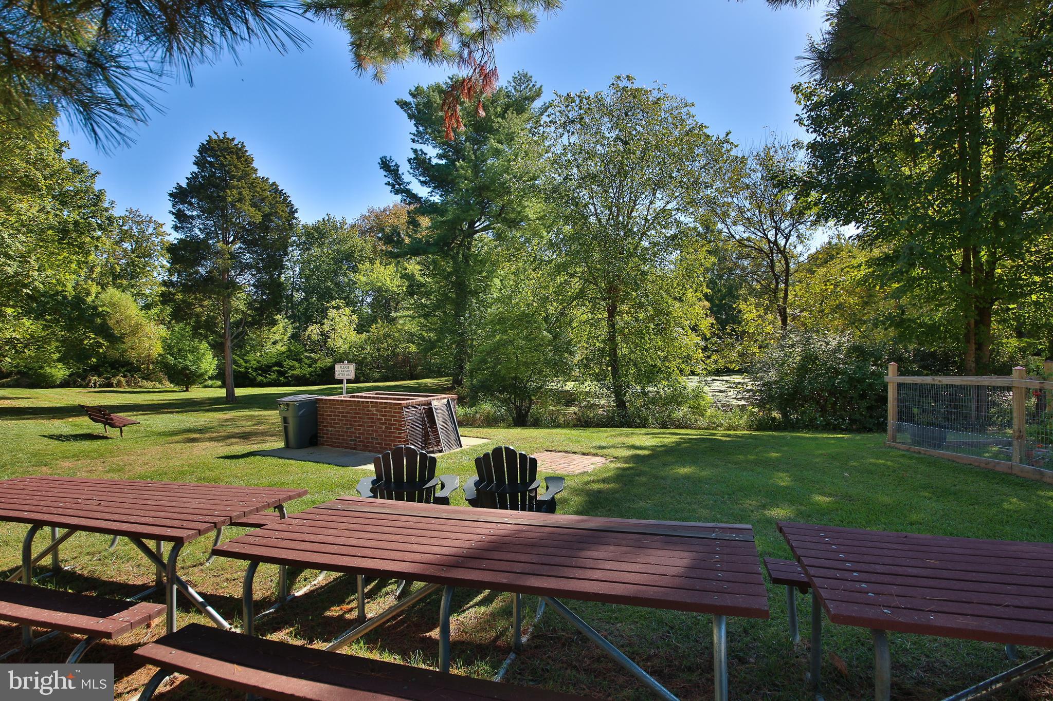 463 Old Forge Crossing, Unit 463 Devon, PA 19333 - Photo 28 of 35 Community picnic area with grill
