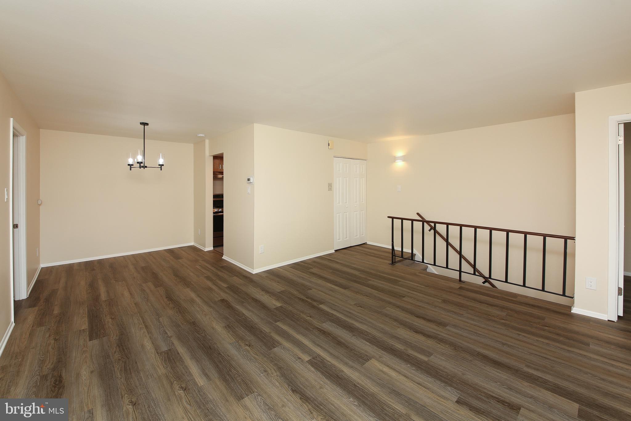 463 Old Forge Crossing, Unit 463 Devon, PA 19333 - Photo 5 of 35 Open living/dining room - freshly painted
