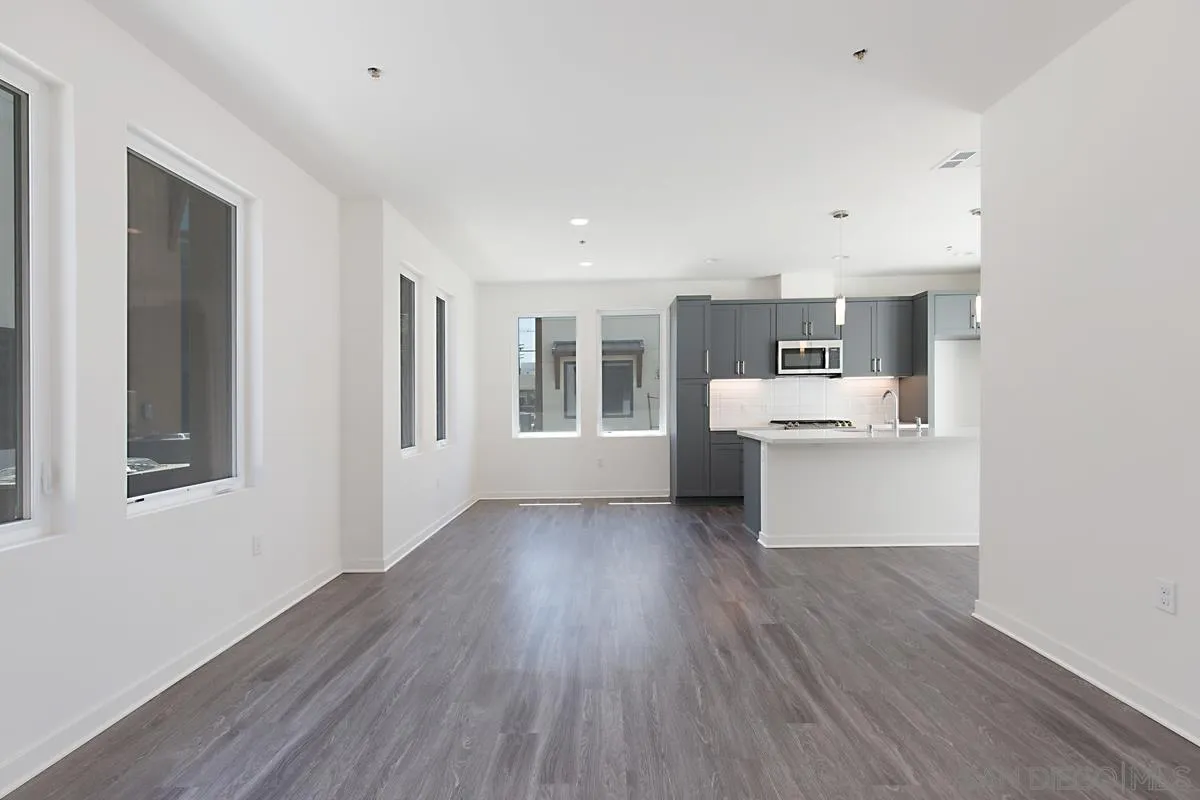 4049 Mission Inn Avenue Riverside, CA 92501 - Photo 19 of 53 a room with stainless steel appliances wooden floors and view living room