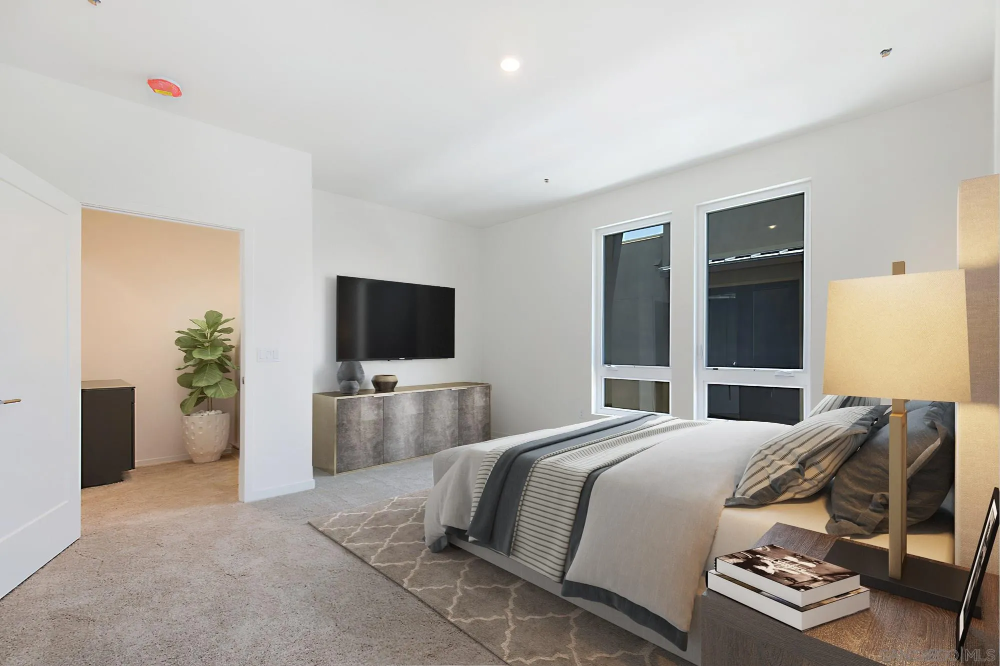 4049 Mission Inn Avenue Riverside, CA 92501 - Photo 6 of 53 a bedroom with a bed and a flat screen tv