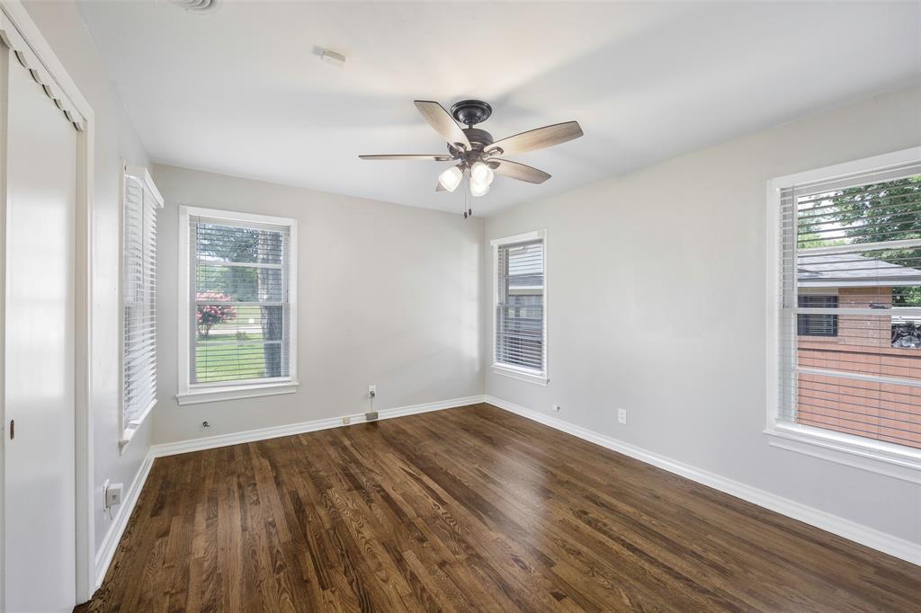 2323 Sutter Street Dallas, TX 75216 - Photo 16 of 30 Master bedroom with hardwood / wood-style flooring and ceiling fan