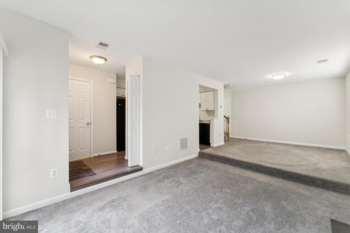 13 Ohara Court Olney, MD 20832 - Photo 6 of 25 an empty room with closet and windows