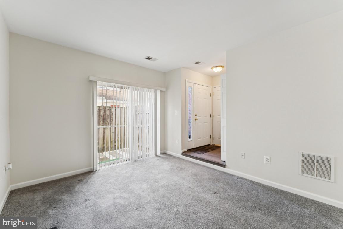 13 Ohara Court Olney, MD 20832 - Photo 10 of 25 an empty room with windows