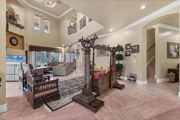 a view of a swimming pool with a lounge chair