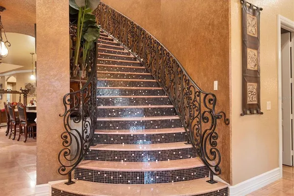 a bathroom with a tub and sink