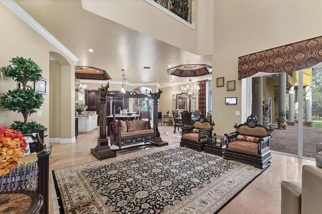 a building outdoor space with patio furniture and glass door