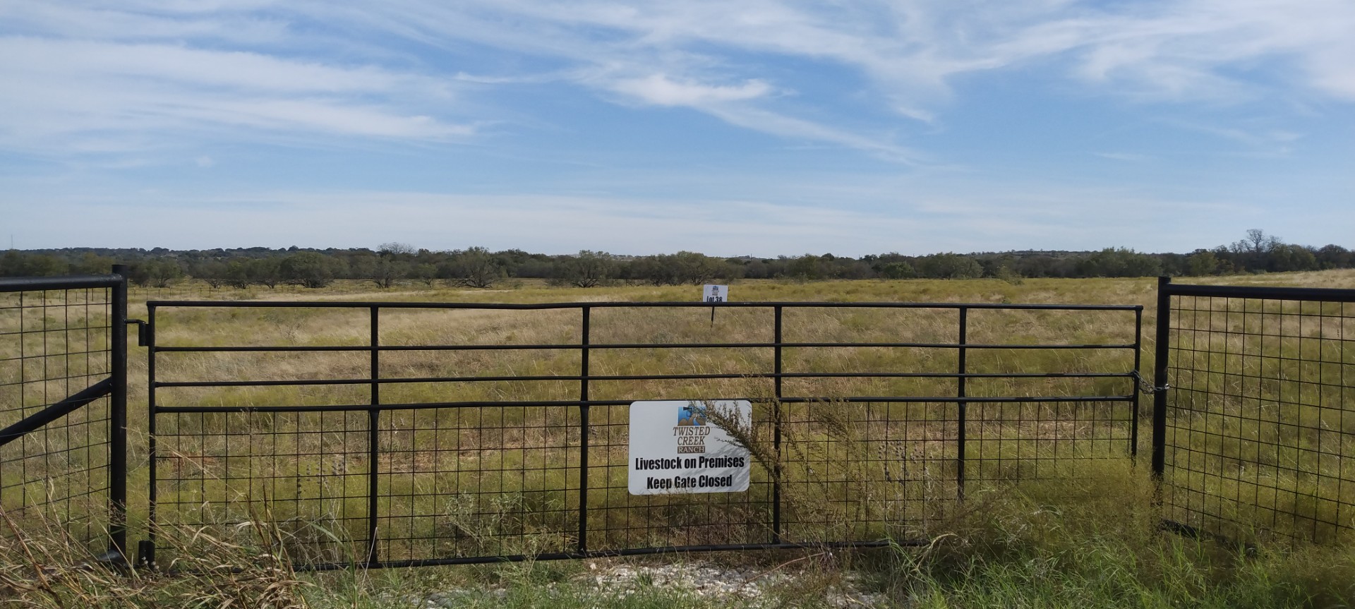266 County Road 266 Gustine, TX 76455 - Photo 6 of 10 A secured entrance gate opens to expansive, pastoral acreage, inviting a tranquil rural lifestyle.