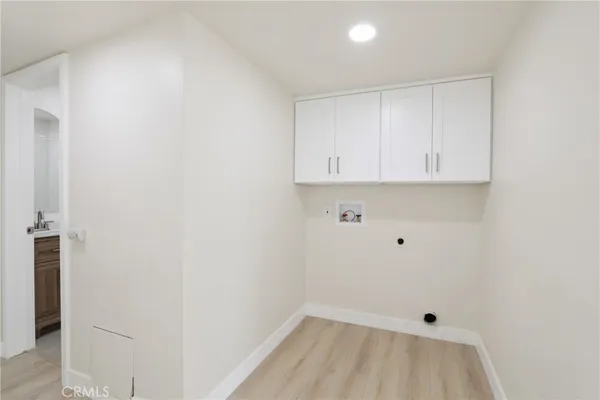 a view of room with cabinets