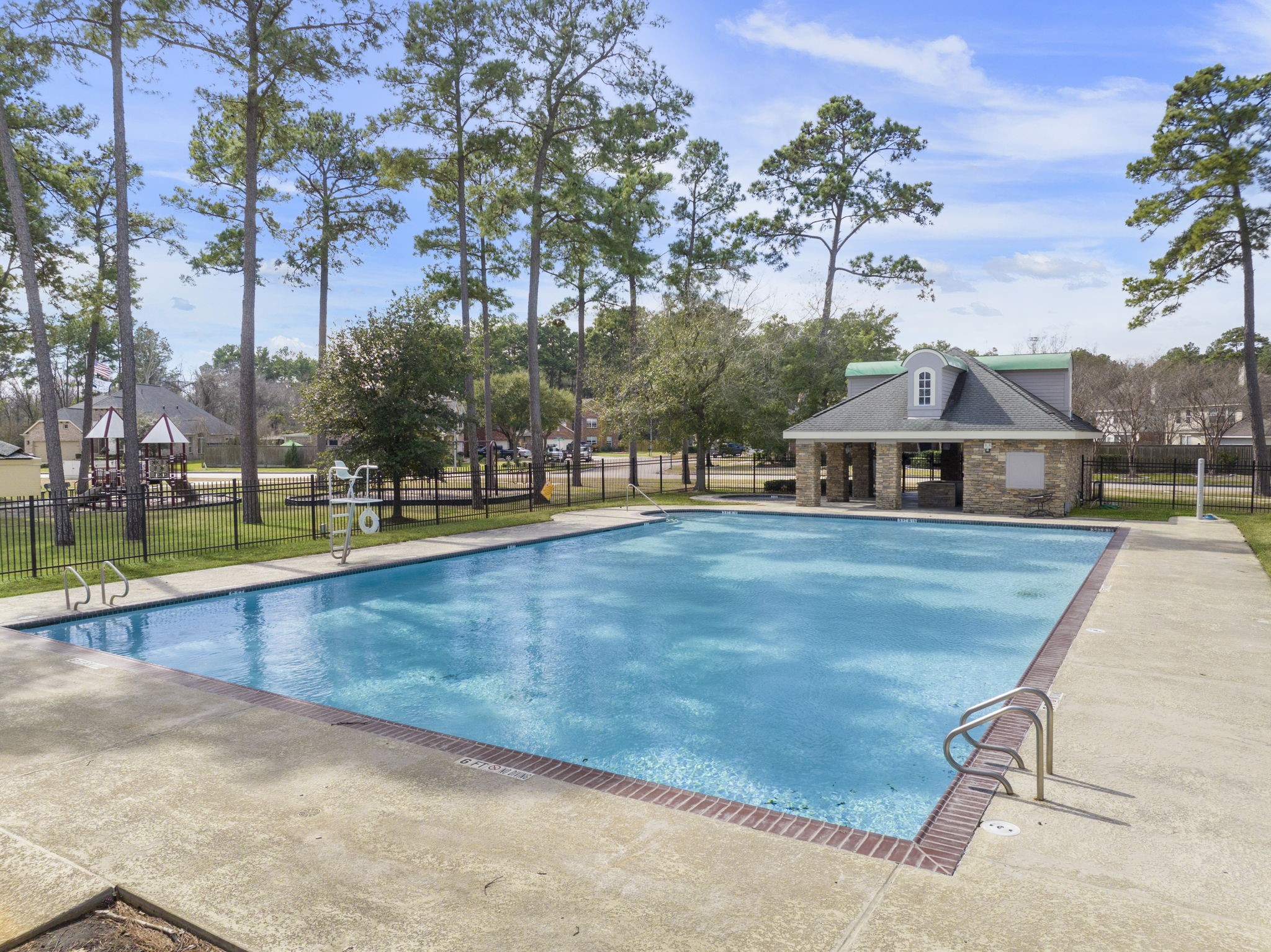 2819 Bradbury Hills Road Spring, TX 77373 - Photo 50 of 50 Dive into relaxation and community spirit with this inviting pool, nestled amidst lush greenery and offering the perfect backdrop for leisure and social gatherings.