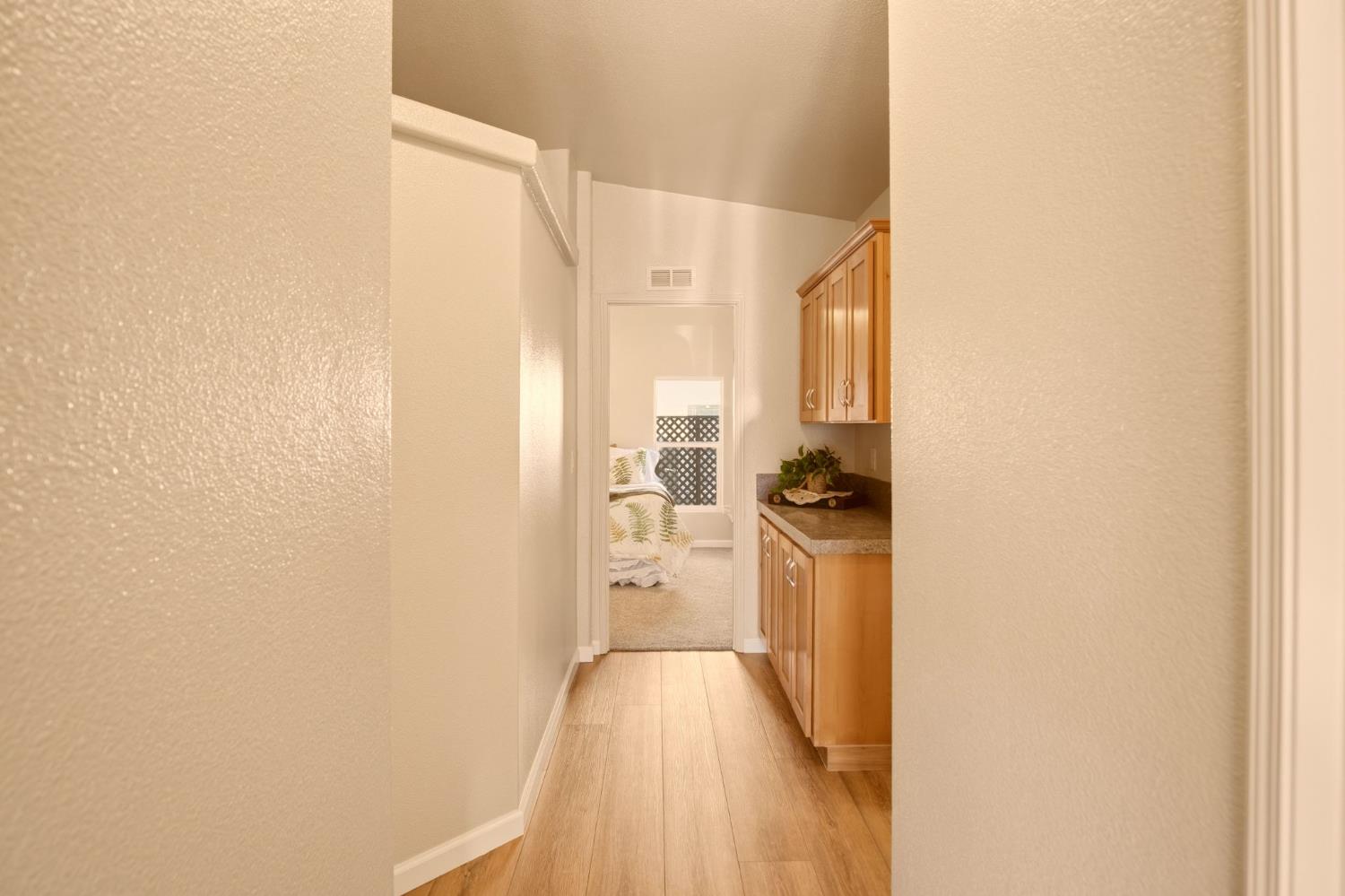 145 Dory Lane Modesto, CA 95356 - Photo 13 of 27 a view of walk in closet with rug