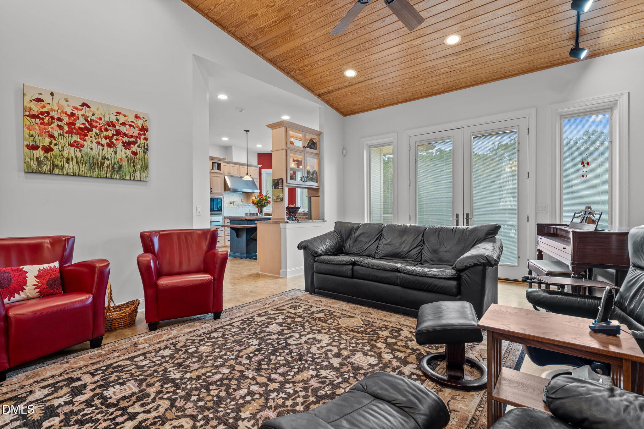 287 Herbie Road Carthage, NC 28327 - Photo 11 of 53 a living room with furniture a rug and a projector