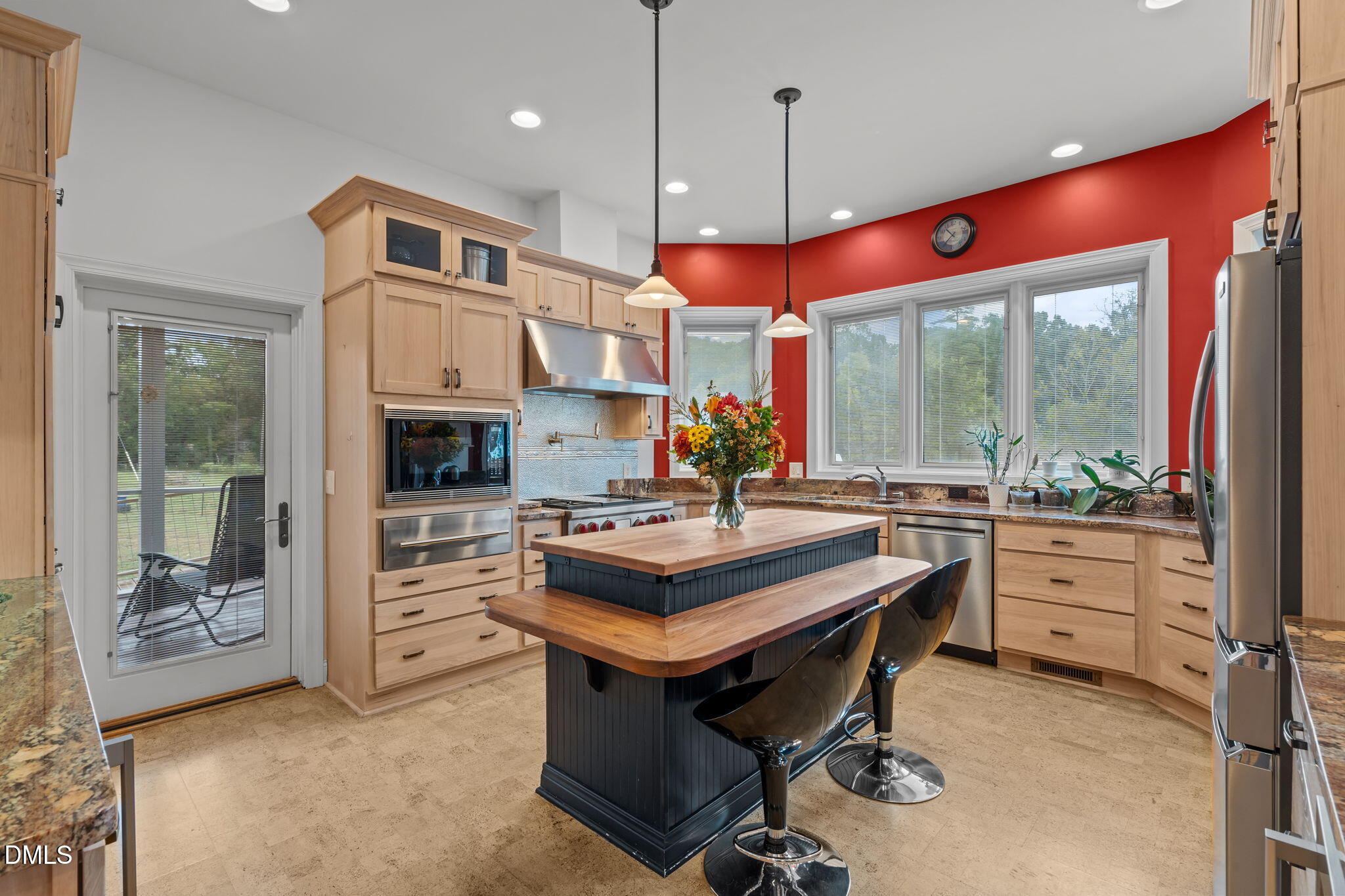 287 Herbie Road Carthage, NC 28327 - Photo 14 of 53 a kitchen with stainless steel appliances granite countertop a stove a refrigerator and a kitchen view