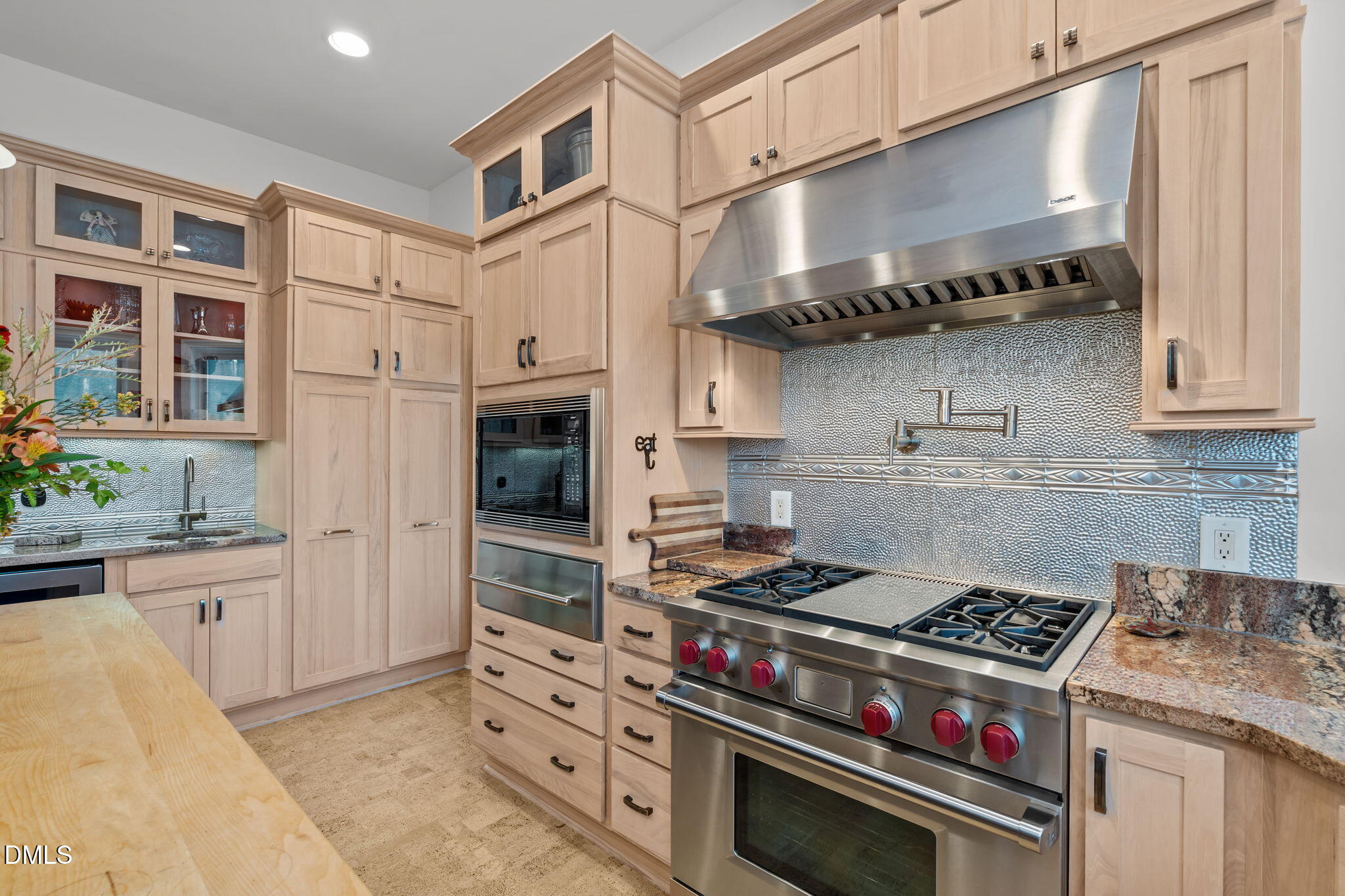 287 Herbie Road Carthage, NC 28327 - Photo 17 of 53 a kitchen with stainless steel appliances granite countertop a stove and a refrigerator