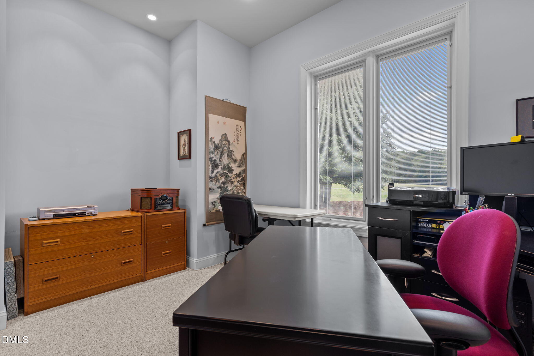 287 Herbie Road Carthage, NC 28327 - Photo 22 of 53 a view of a workspace with furniture and a window