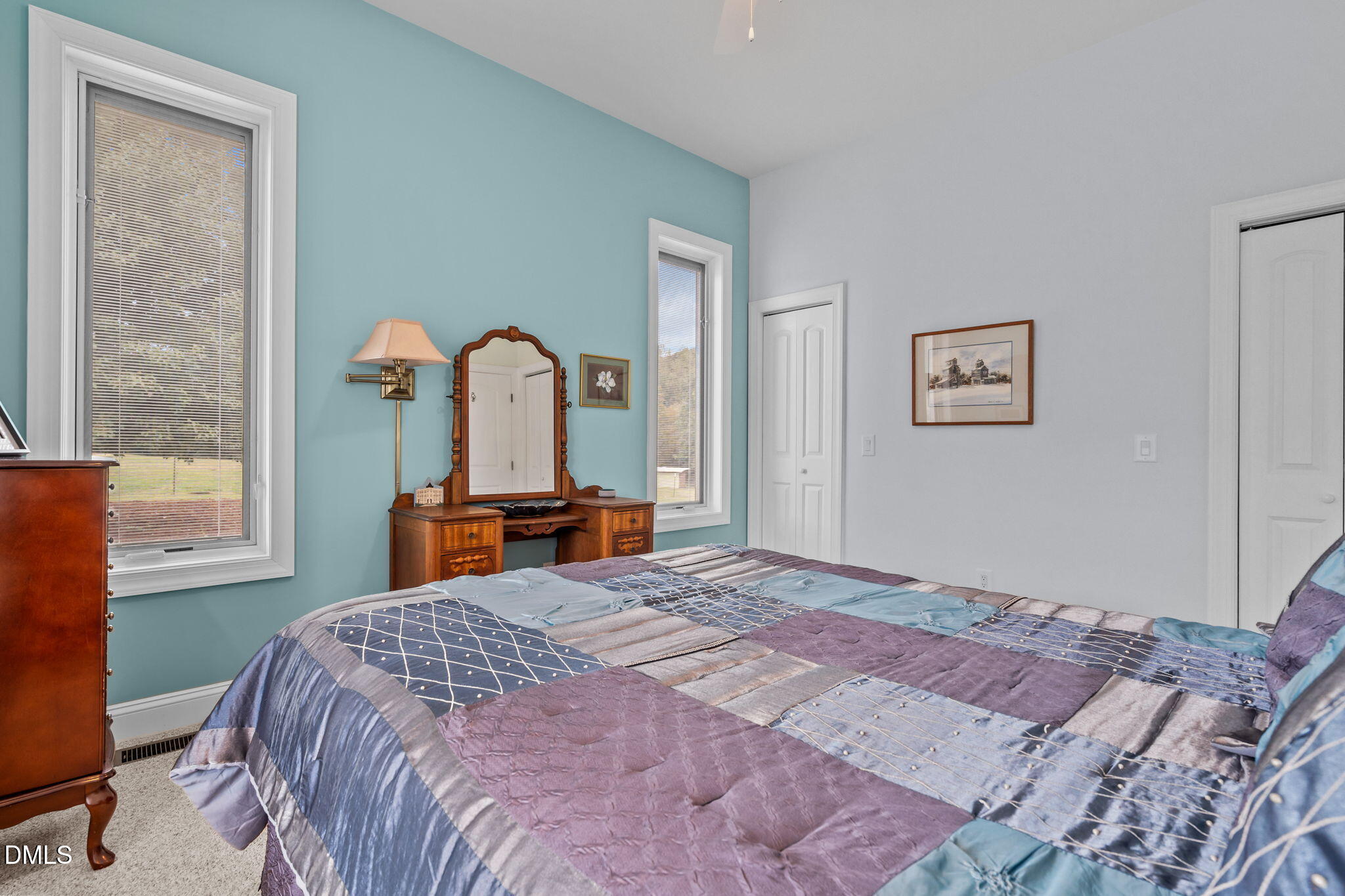 287 Herbie Road Carthage, NC 28327 - Photo 24 of 53 a bedroom with a bed and a dresser next to a window