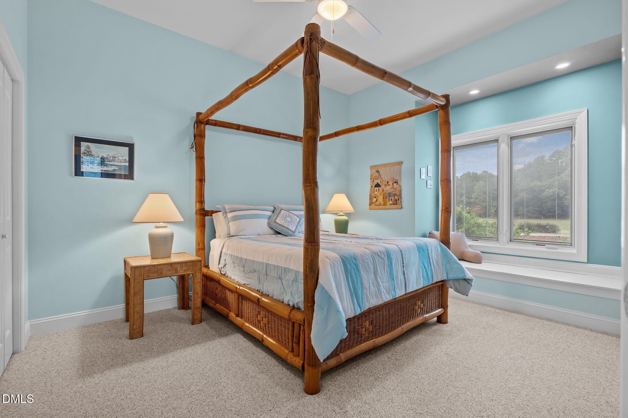 287 Herbie Road Carthage, NC 28327 - Photo 26 of 53 a bed sitting in a bedroom next to a window