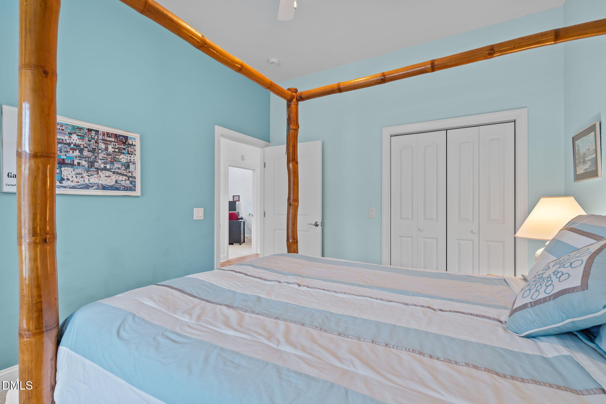 287 Herbie Road Carthage, NC 28327 - Photo 27 of 53 a bedroom with a bed and a lamp on table