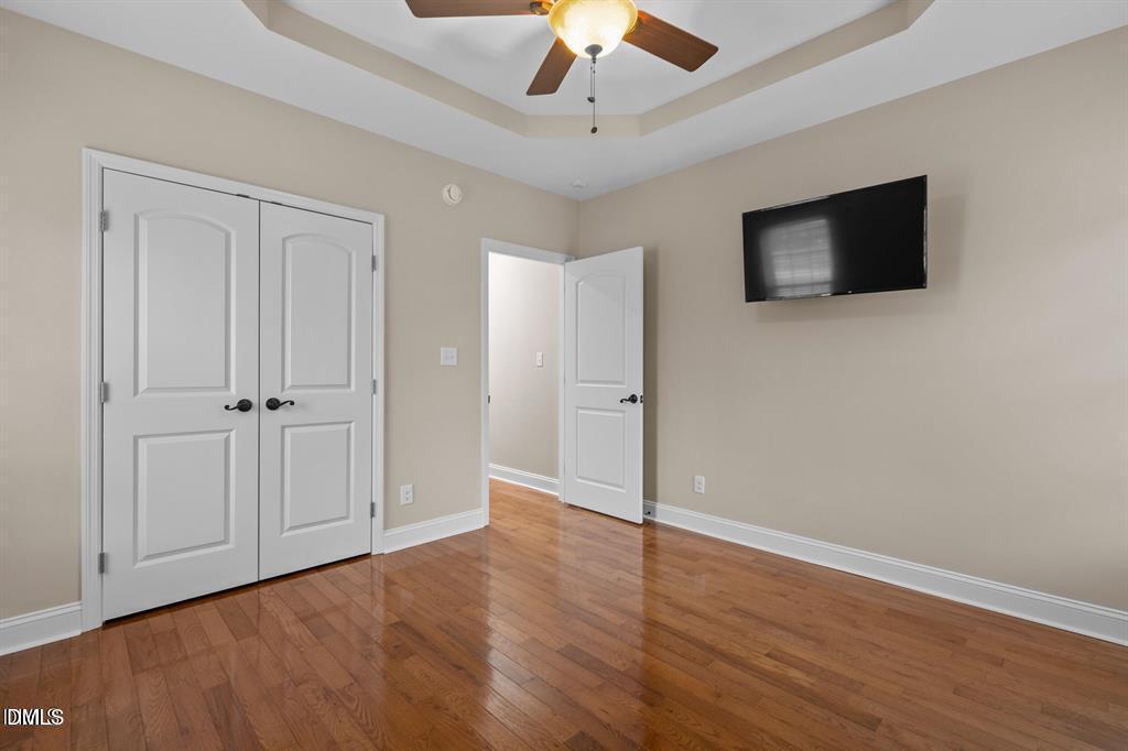2751 Buie - Philadelphus Road Pembroke, NC 28372 - Photo 16 of 30 a view of an empty room with a flat screen tv