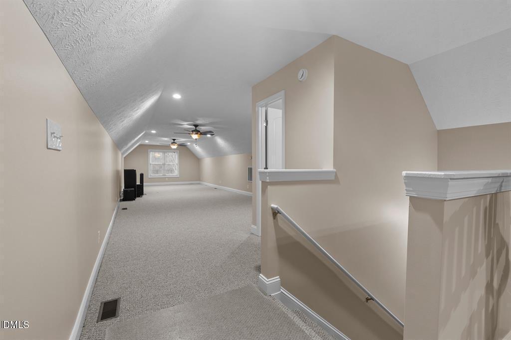 2751 Buie - Philadelphus Road Pembroke, NC 28372 - Photo 20 of 30 a view of a hallway with workspace