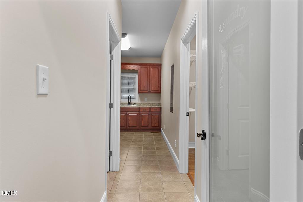 2751 Buie - Philadelphus Road Pembroke, NC 28372 - Photo 27 of 30 a view of a hallway with a kitchen
