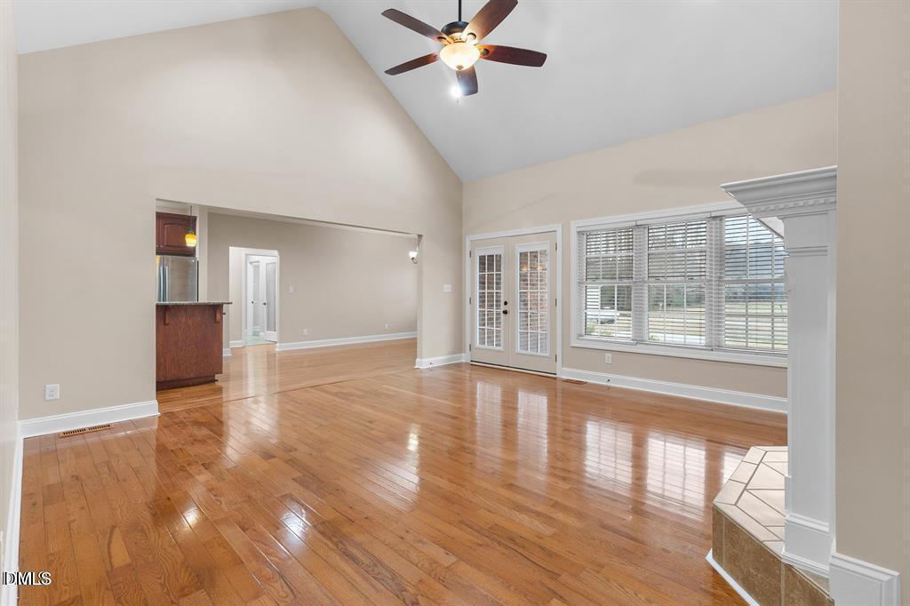 2751 Buie - Philadelphus Road Pembroke, NC 28372 - Photo 8 of 30 a view of empty room with wooden floor and fan