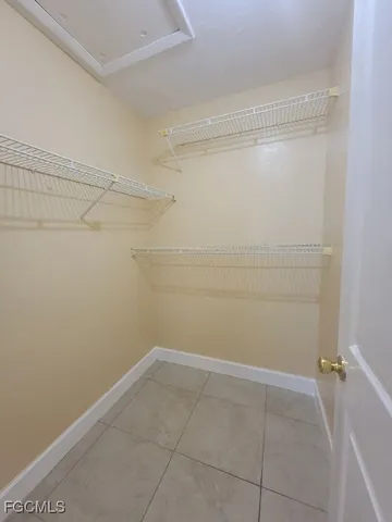 a view of an empty walk in closet