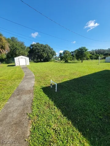 a view of a golf course with a lake