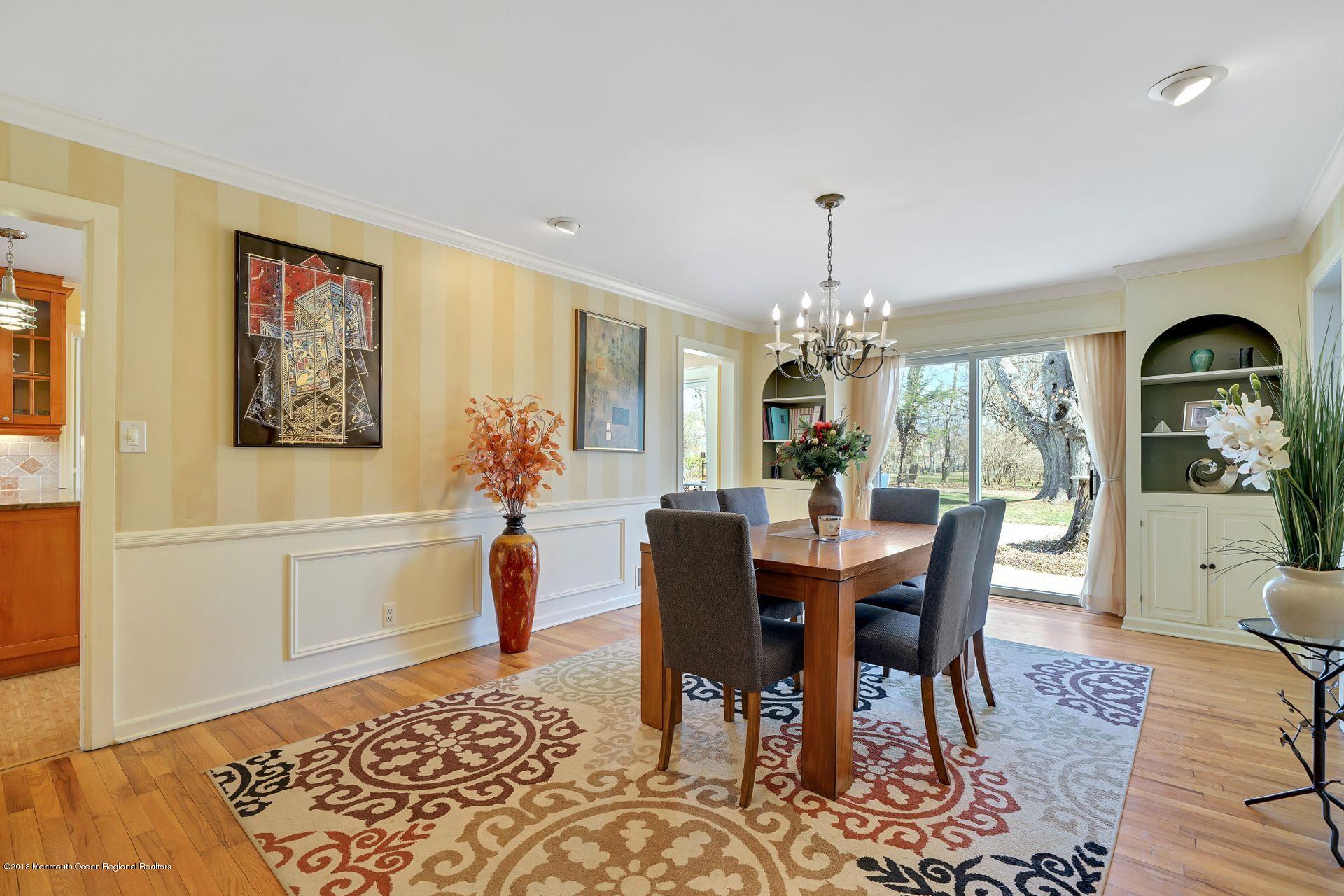 11 Heathcliff Road Rumson, NJ 07760 - Photo 11 of 31 a view of a dining room with furniture window and wooden floor