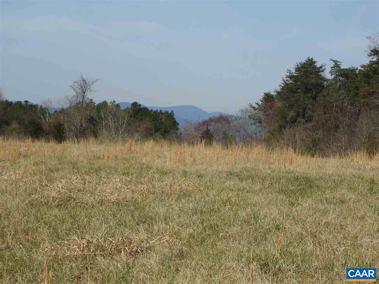 35 Guildford Farm Road Ruckersville, VA 22968 - Photo 5 of 23 a view of a lake with a mountain in the background