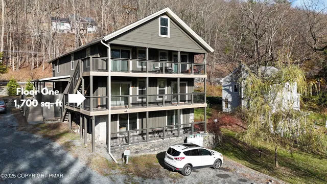 a front view of a house with swimming pool