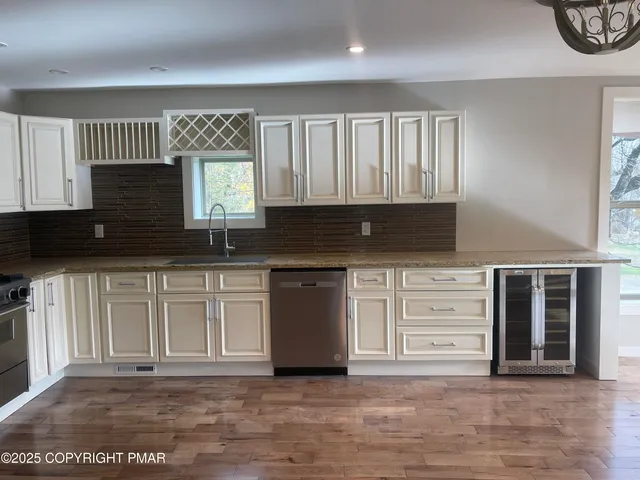a view of a balcony with wooden floor