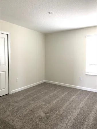 an empty room with a natural light