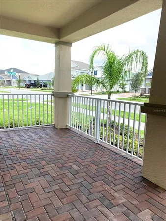 a view of balcony with floor to ceiling window and outdoor space