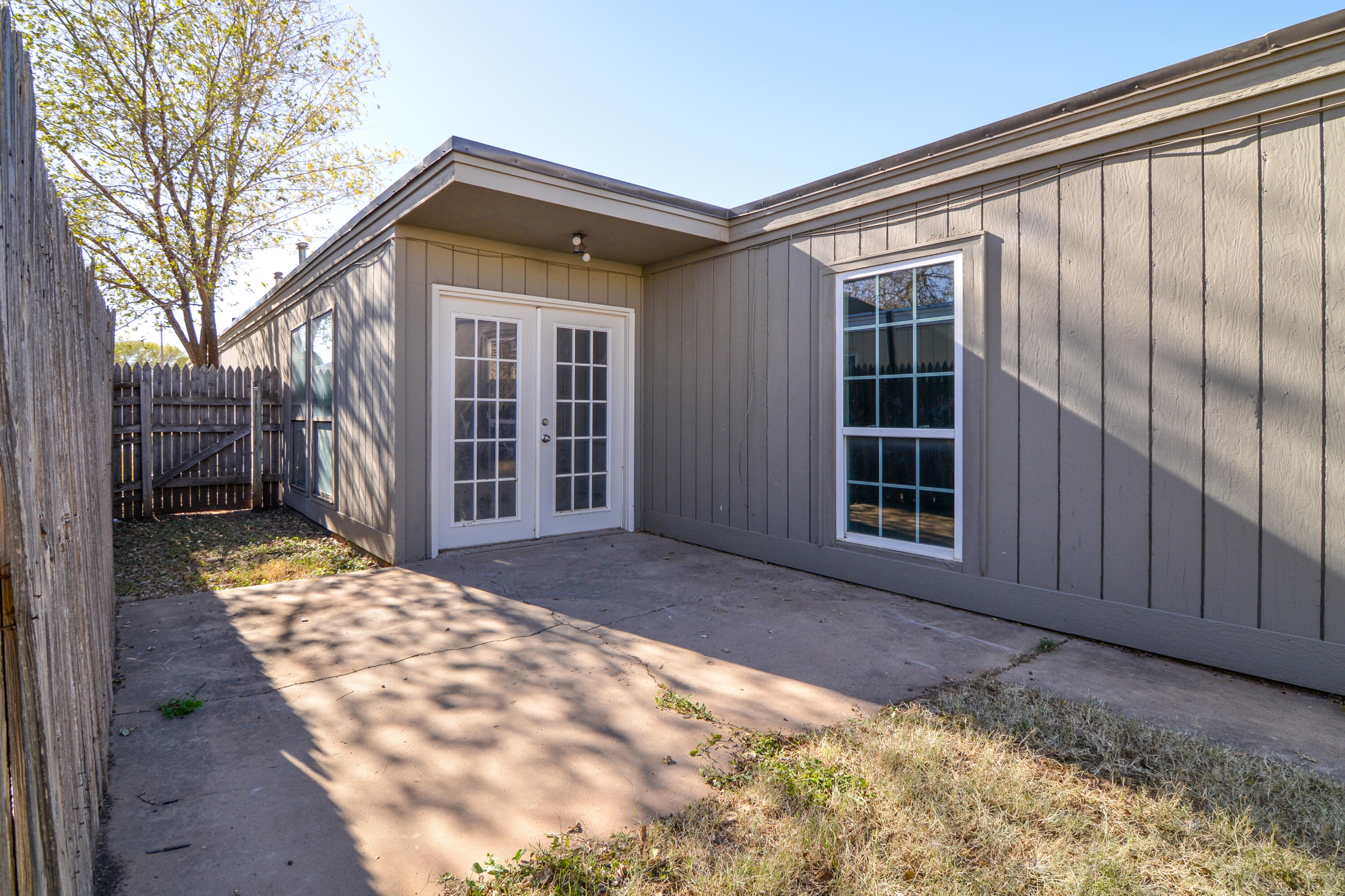 3714 53rd Street, Unit A & B Lubbock, TX 79413 - Photo 27 of 28 a view of house with backyard porch
