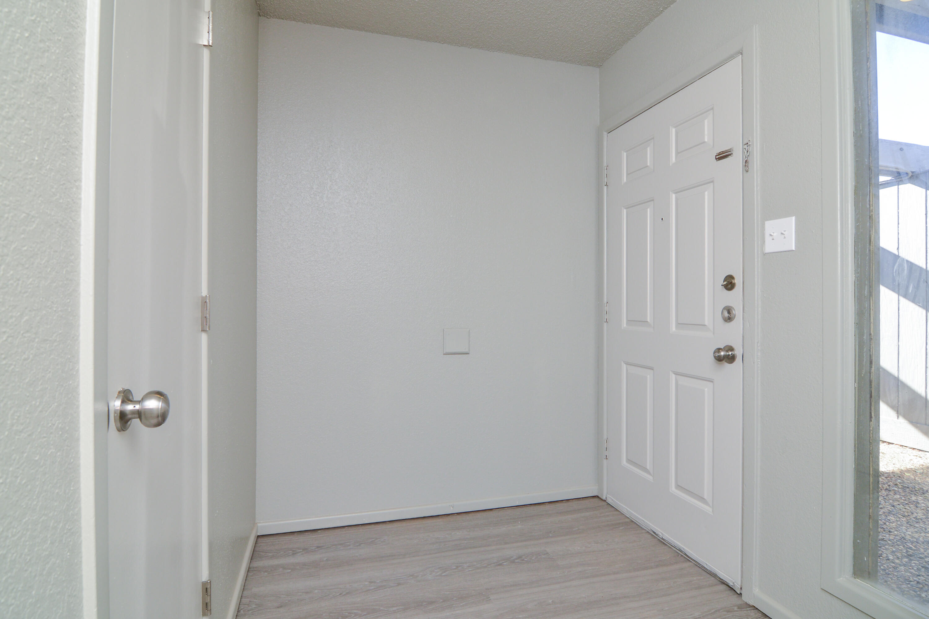 3714 53rd Street, Unit A & B Lubbock, TX 79413 - Photo 3 of 28 a view of a hallway with wooden floor