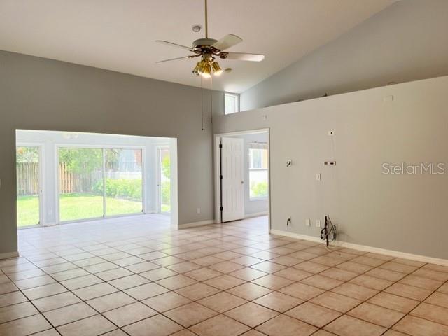 405 Arlington Avenue East Oldsmar, FL 34677 - Photo 5 of 21 a view of an empty room with a window