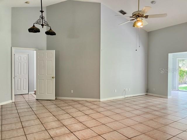 405 Arlington Avenue East Oldsmar, FL 34677 - Photo 6 of 21 a view of an empty room and window