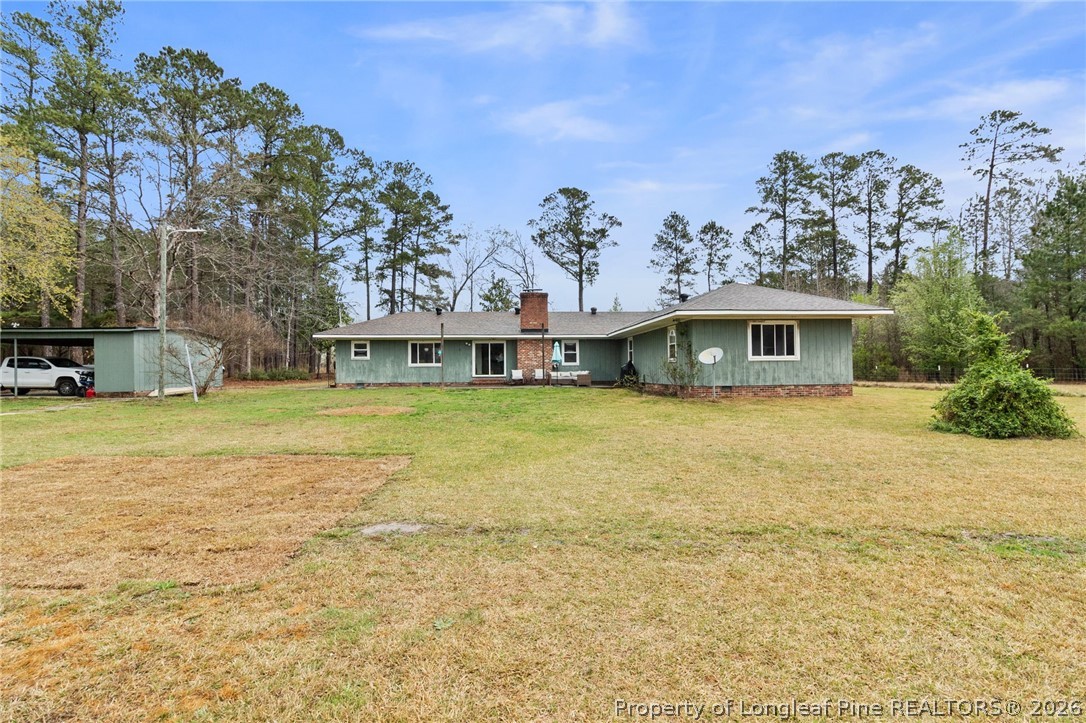 730 Slocomb Road Fayetteville, NC 28311 - Photo 2 of 48 a view of house with a swimming pool