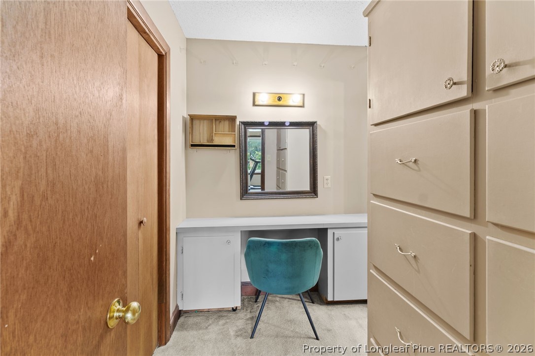 730 Slocomb Road Fayetteville, NC 28311 - Photo 23 of 48 a room with windows and a refrigerator