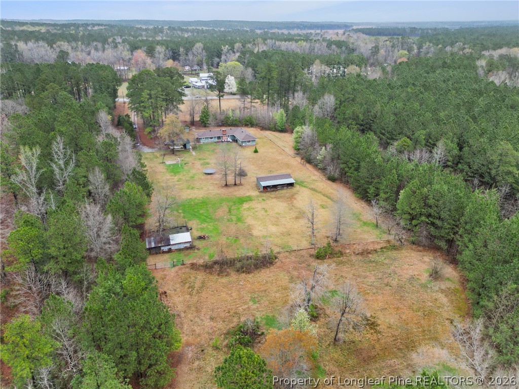 730 Slocomb Road Fayetteville, NC 28311 - Photo 46 of 48 an aerial view of residential houses with outdoor space and trees