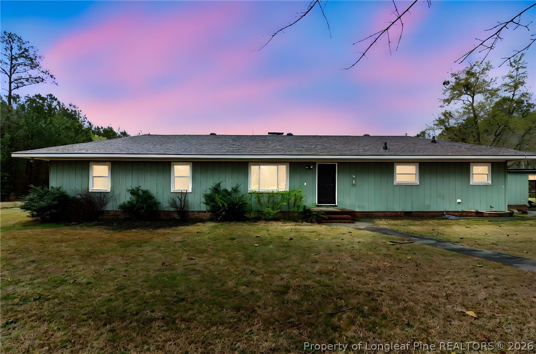 730 Slocomb Road Fayetteville, NC 28311 - Photo 48 of 48 a front view of a house with a yard and garage
