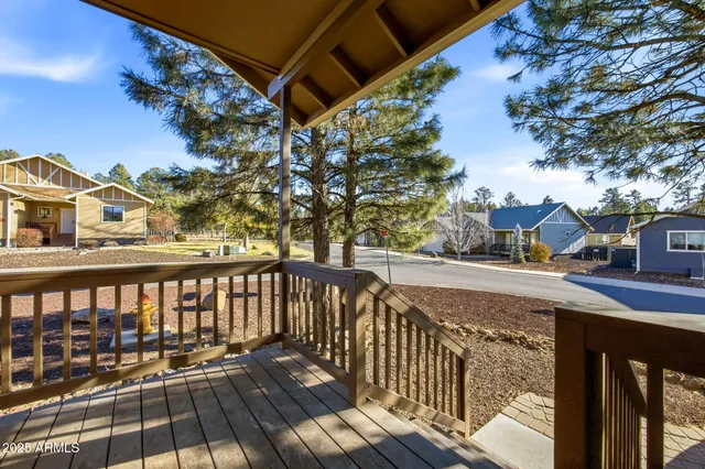 a view of a balcony with chairs