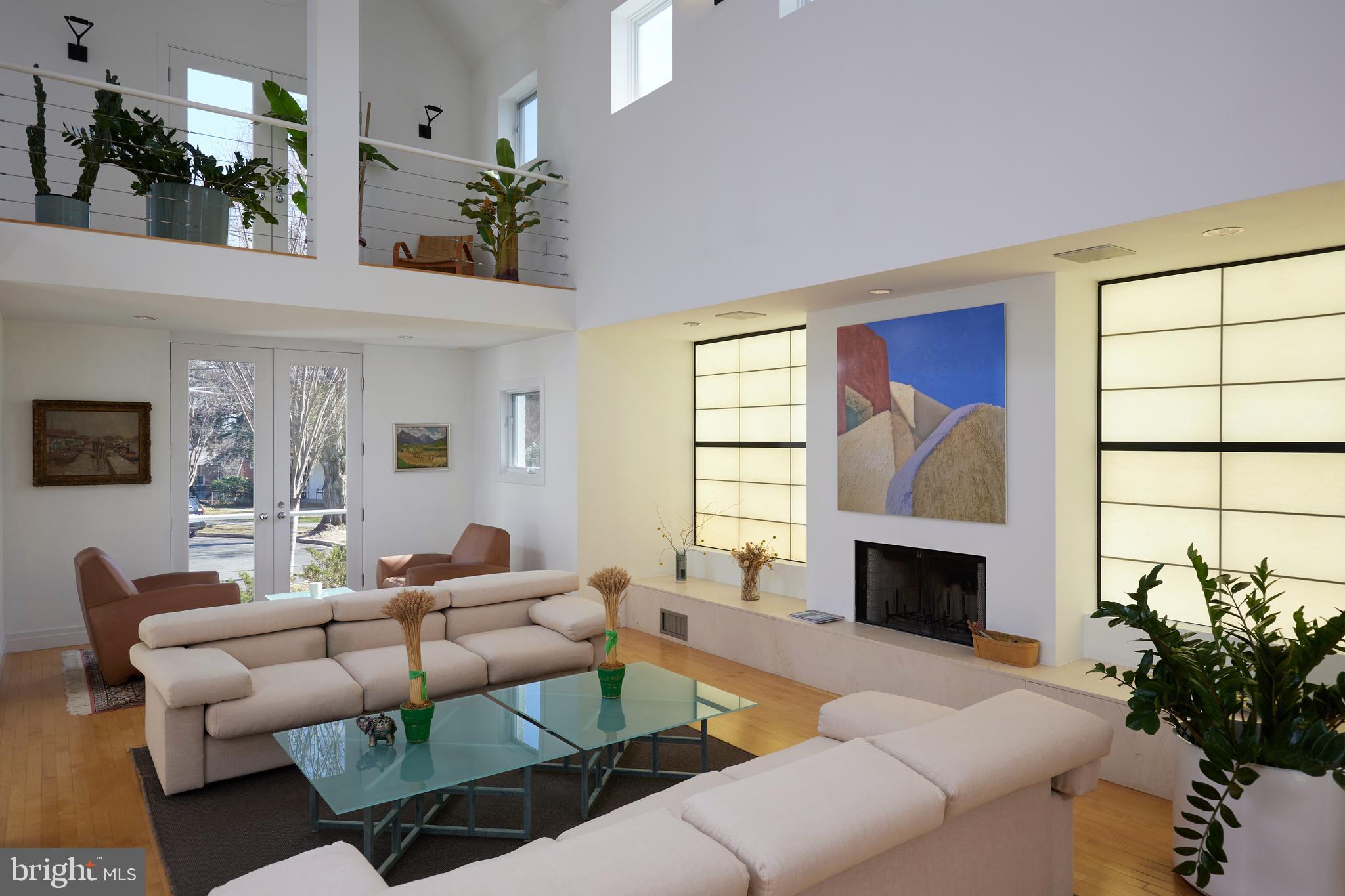 4527 Q Place Northwest Washington, DC 20007 - Photo 14 of 59 a living room with furniture fireplace and a large window