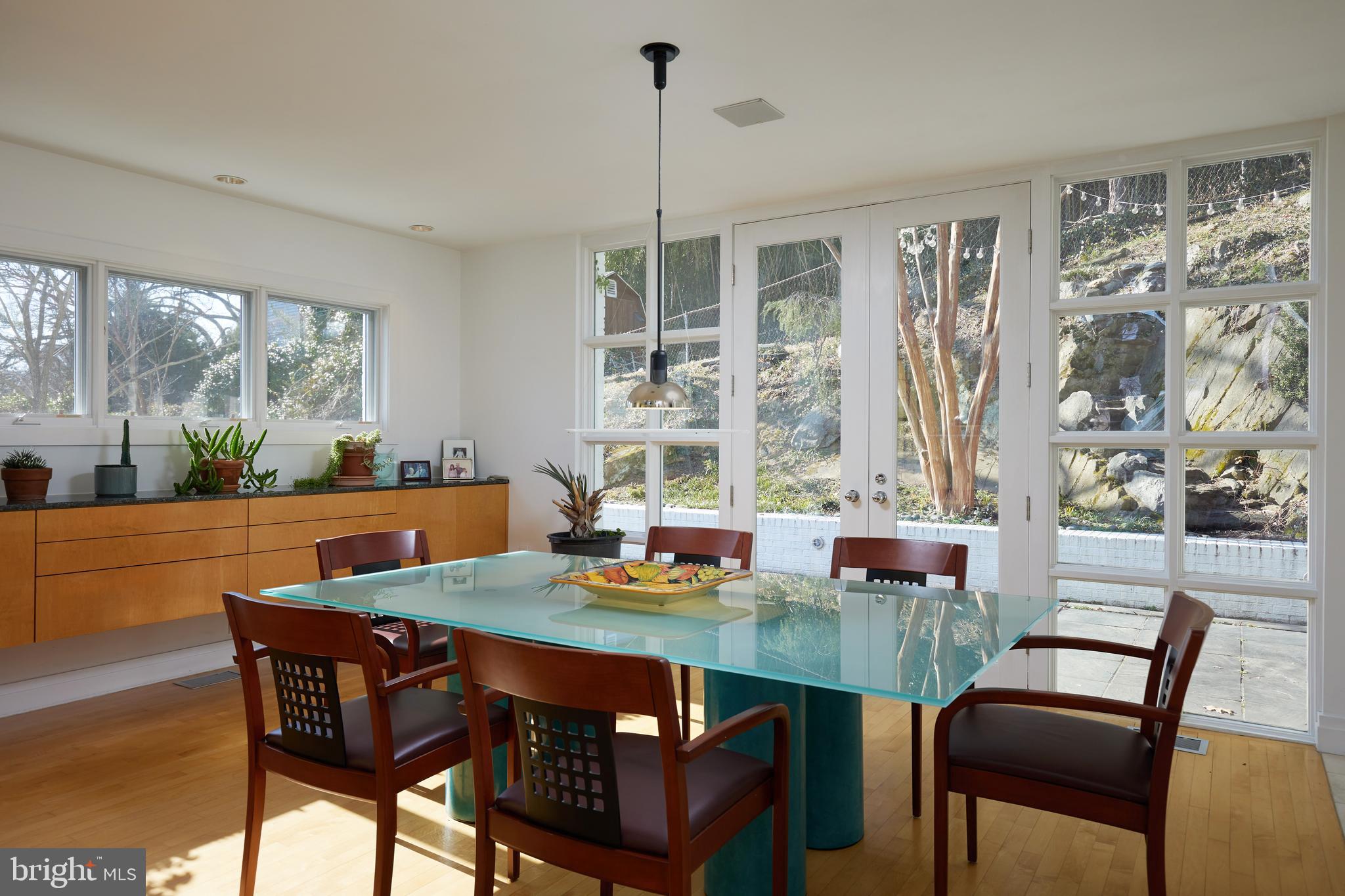 4527 Q Place Northwest Washington, DC 20007 - Photo 23 of 59 a view of a dining room with furniture window and outside view