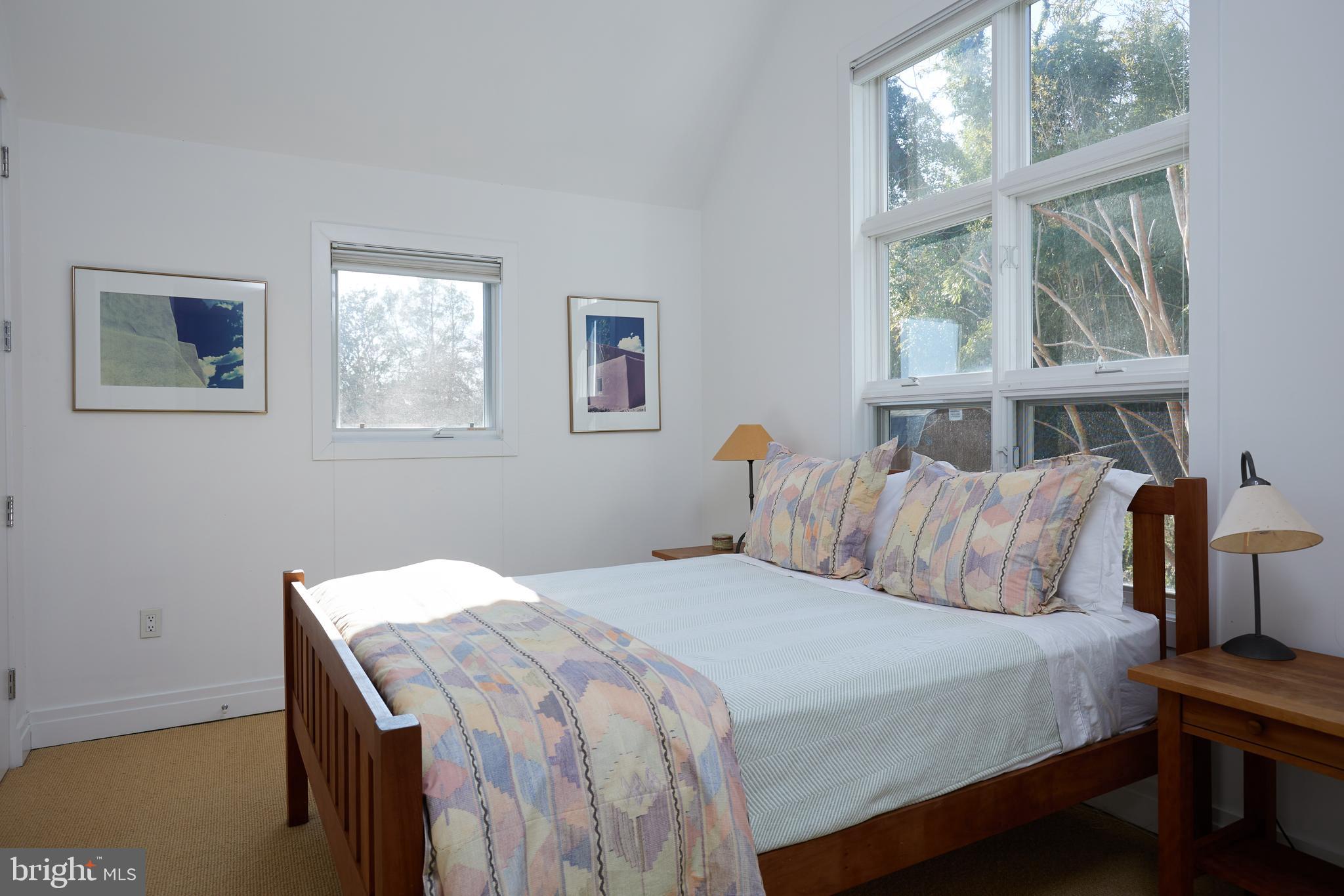 4527 Q Place Northwest Washington, DC 20007 - Photo 43 of 59 a bedroom with a bed and a window