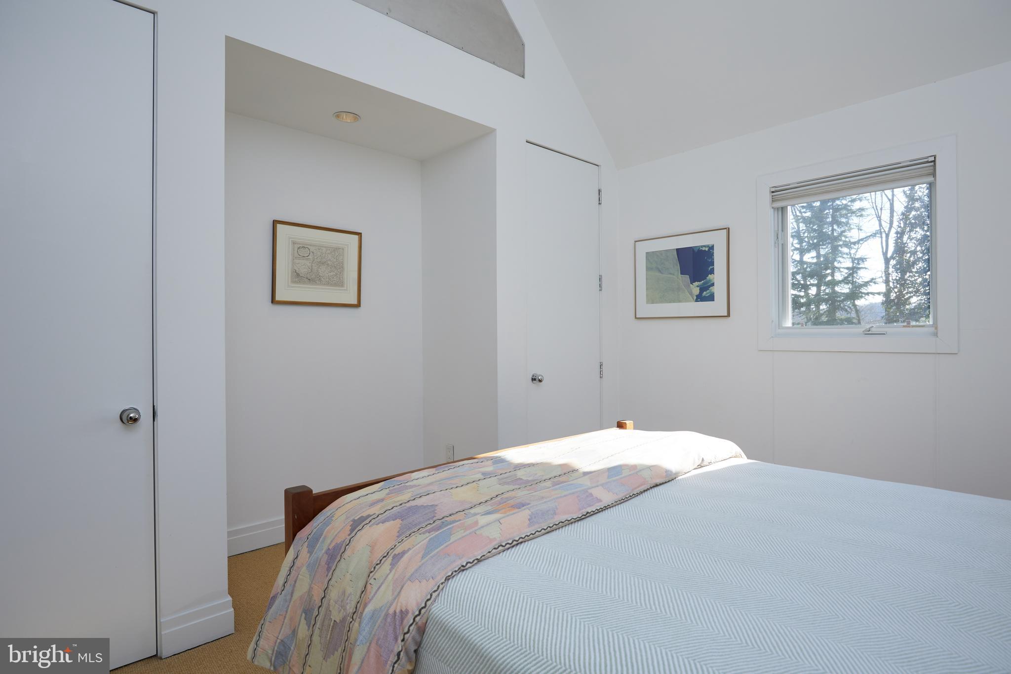 4527 Q Place Northwest Washington, DC 20007 - Photo 45 of 59 a bedroom with a bed and a window