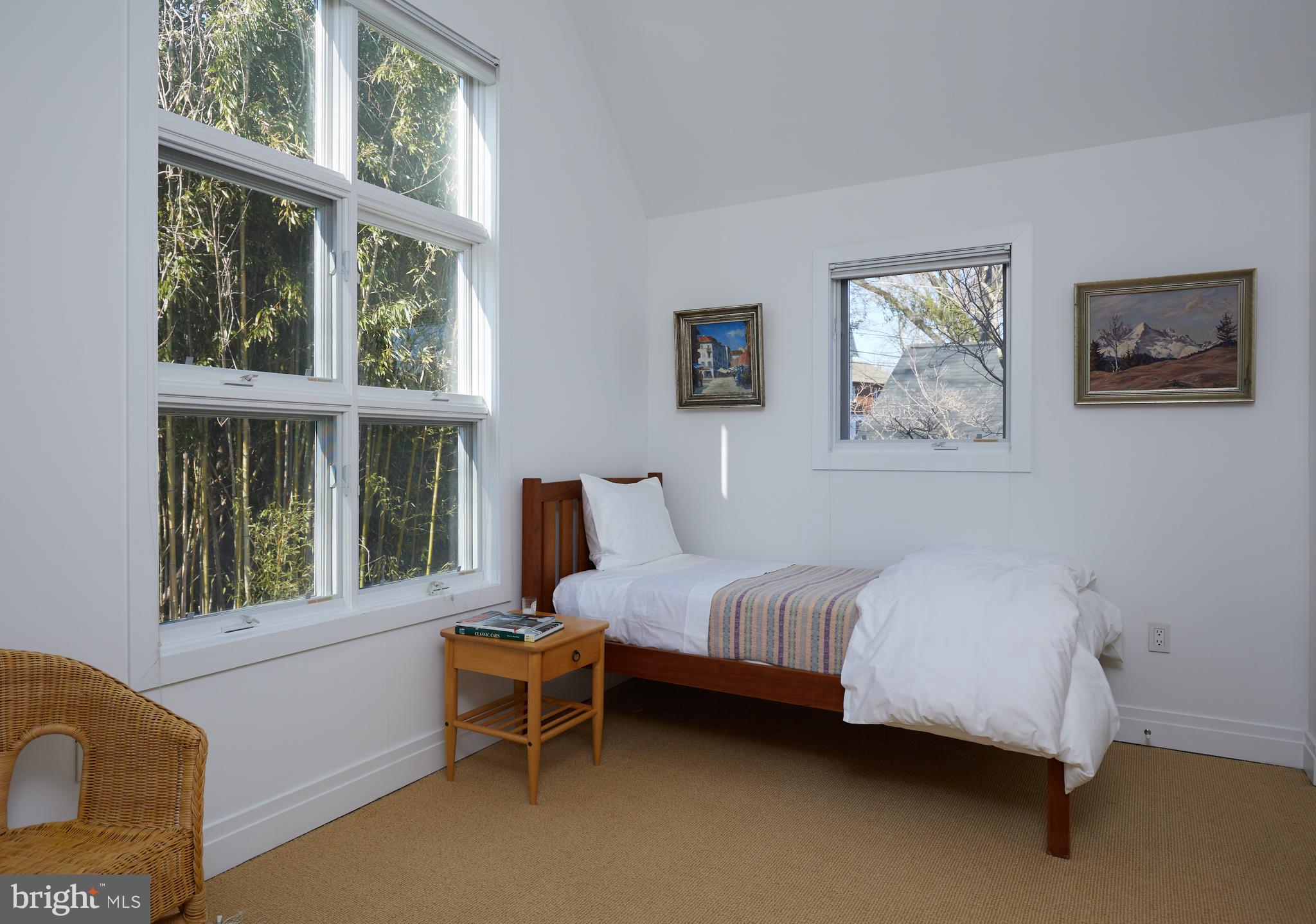 4527 Q Place Northwest Washington, DC 20007 - Photo 46 of 59 a bedroom with a bed and a window