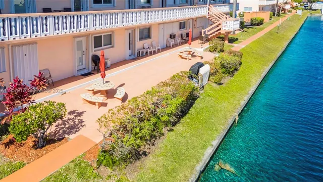 a view of a balcony with chairs