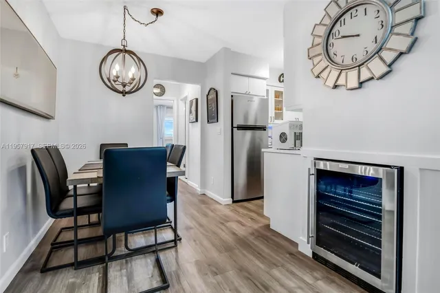 a kitchen with stainless steel appliances a refrigerator and a sink